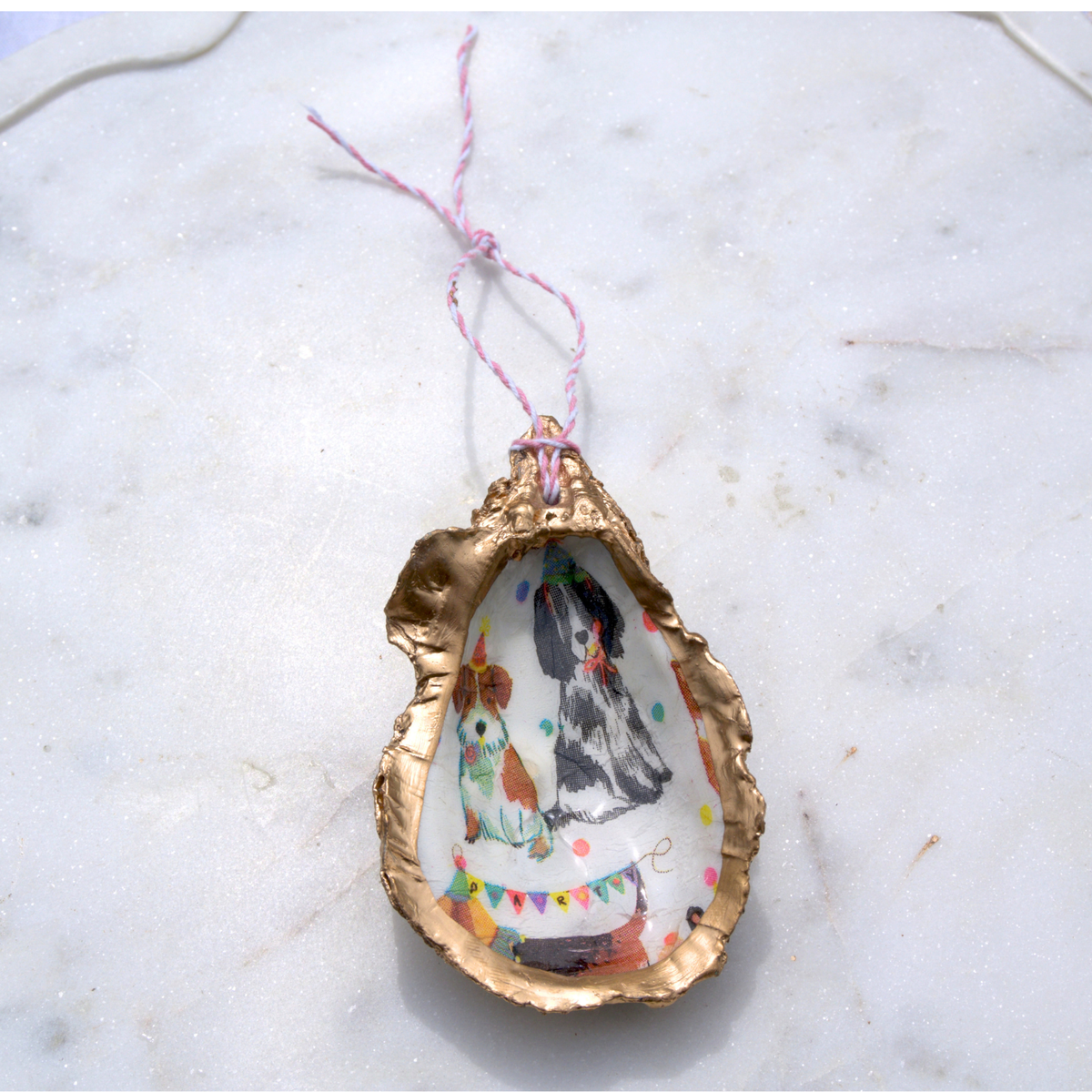 Celebration Dogs Oyster Ornament